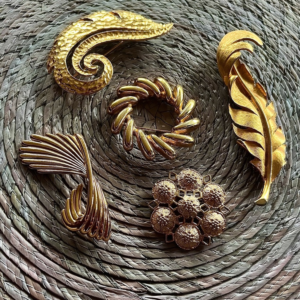 Bundle of 5 gold tone brooches- some marked